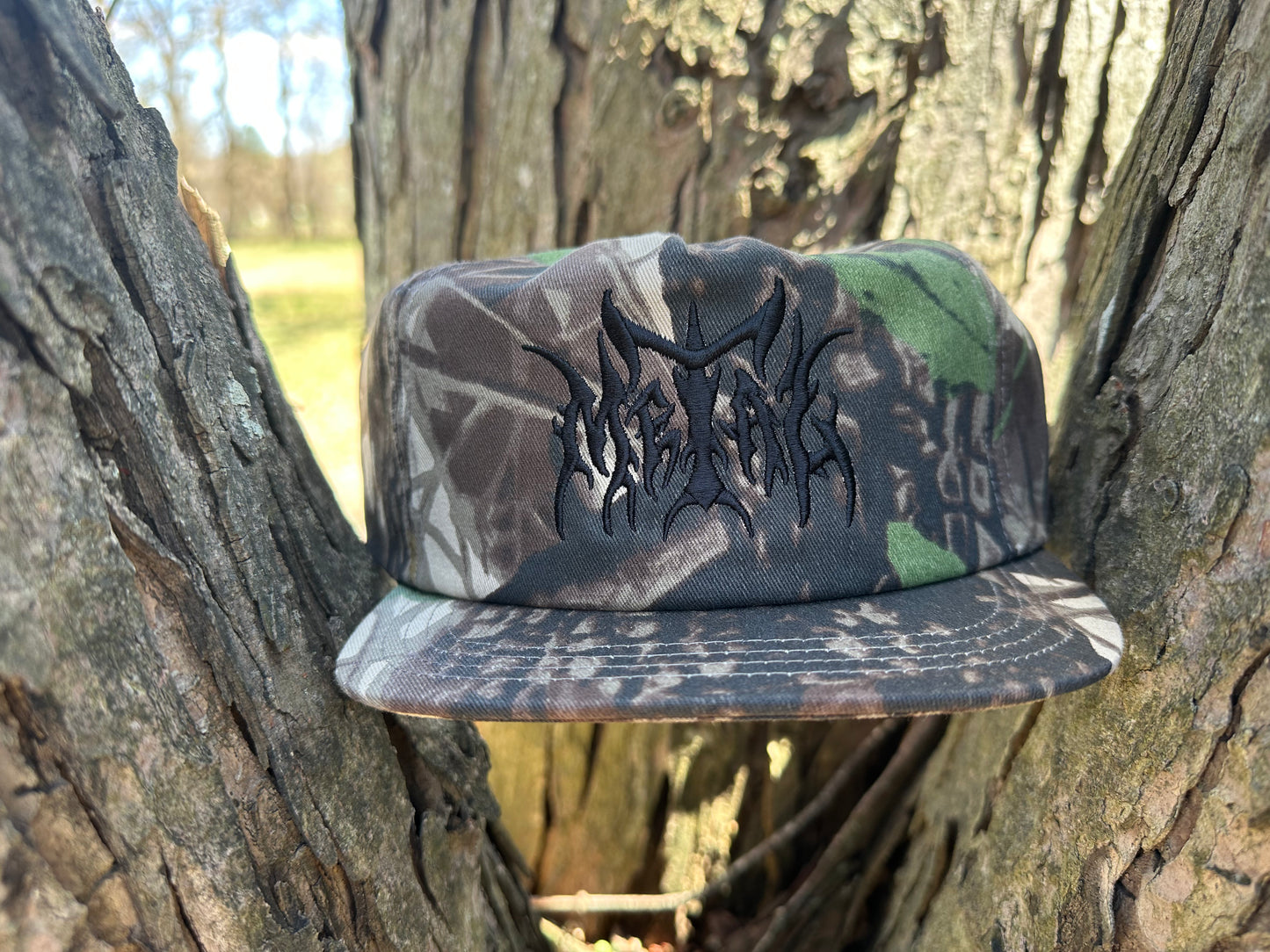 METAL LOGO SHORT BRIM PINE BARRENS CAMO HAT